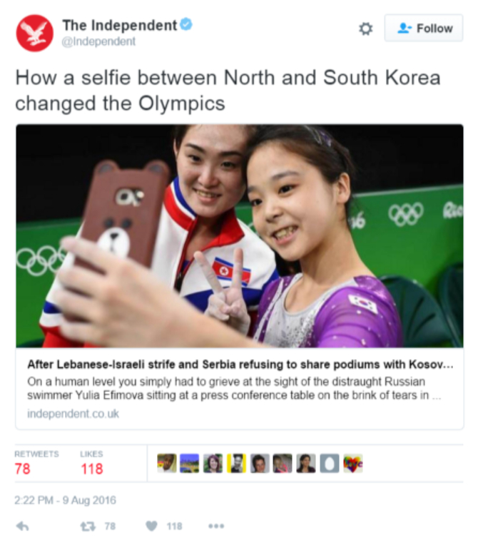 screenshot of tweet by The Independent showing North Korean and South Korean Olympic athletes selfie