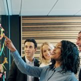 Group of folks collaborating in a meeting