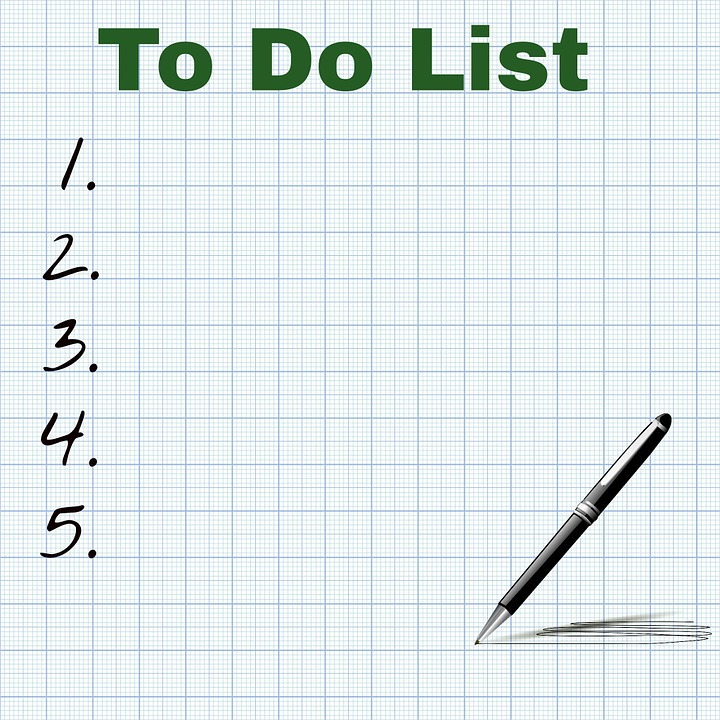 sheet of paper marked "to do" with a numbered list for items can be used to help manage your time to be more productive.