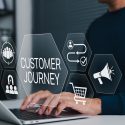 Person on laptop exploring "Customer Journey"